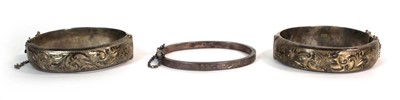 Lot 526 - An Edwardian narrow engraved silver hinged...