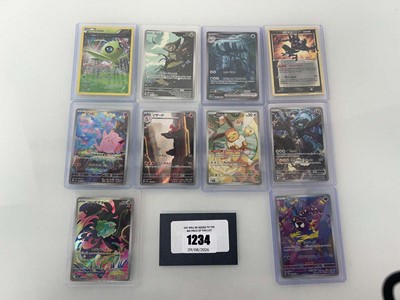 Lot 1234 - (10) Top Loaded English/Japanese Pokémon TCG...