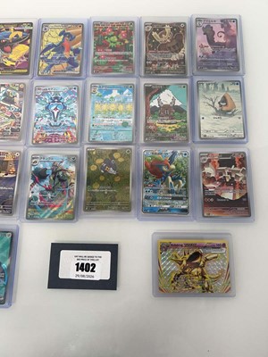 Lot 1402 - Approx. 25 Top Loaded Pokémon cards from...