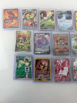 Lot 1403 - Approx. 25 Top Loaded Pokémon cards from...
