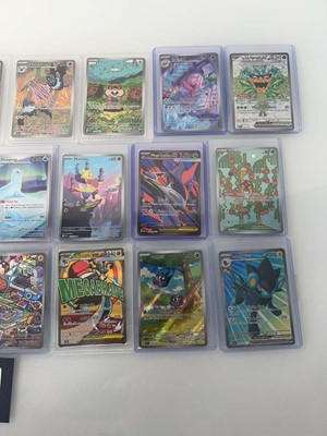 Lot 1403 - Approx. 25 Top Loaded Pokémon cards from...