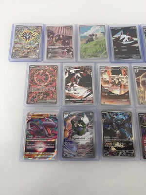 Lot 1404 - Approx. 25 Top Loaded Pokémon cards from...
