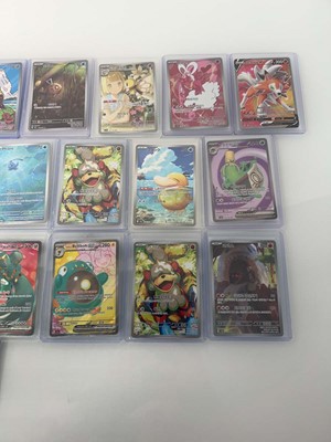 Lot 1404 - Approx. 25 Top Loaded Pokémon cards from...
