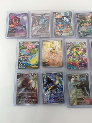 Lot 1405 - Approx. 25 Top Loaded Pokémon cards from...