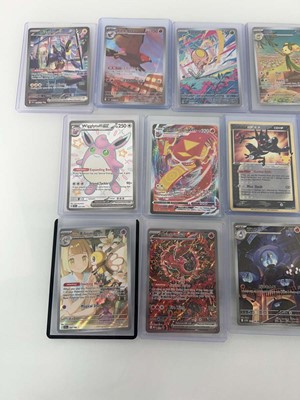 Lot 1406 - Approx. 25 Top Loaded Pokémon cards from...