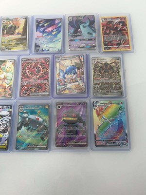 Lot 1406 - Approx. 25 Top Loaded Pokémon cards from...