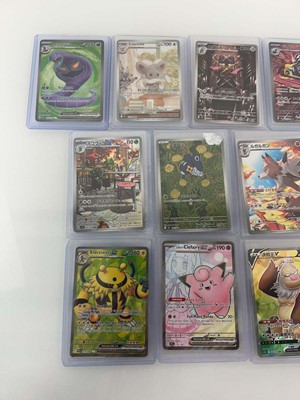 Lot 1407 - Approx. 25 Top Loaded Pokémon cards from...