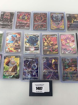 Lot 1407 - Approx. 25 Top Loaded Pokémon cards from...