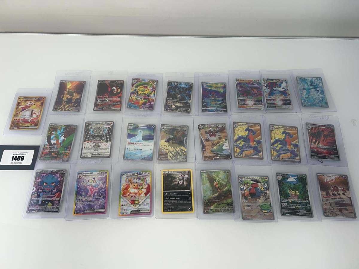 Lot 1409 - Approx. 25 Top Loaded Pokémon cards from...