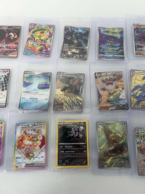 Lot 1409 - Approx. 25 Top Loaded Pokémon cards from...