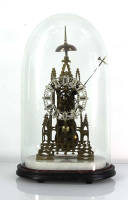 Lot 59 - A late 19th century brass skeleton clock...