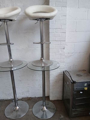 Lot 592 - Glasstop circular poseur table with 2 cream...