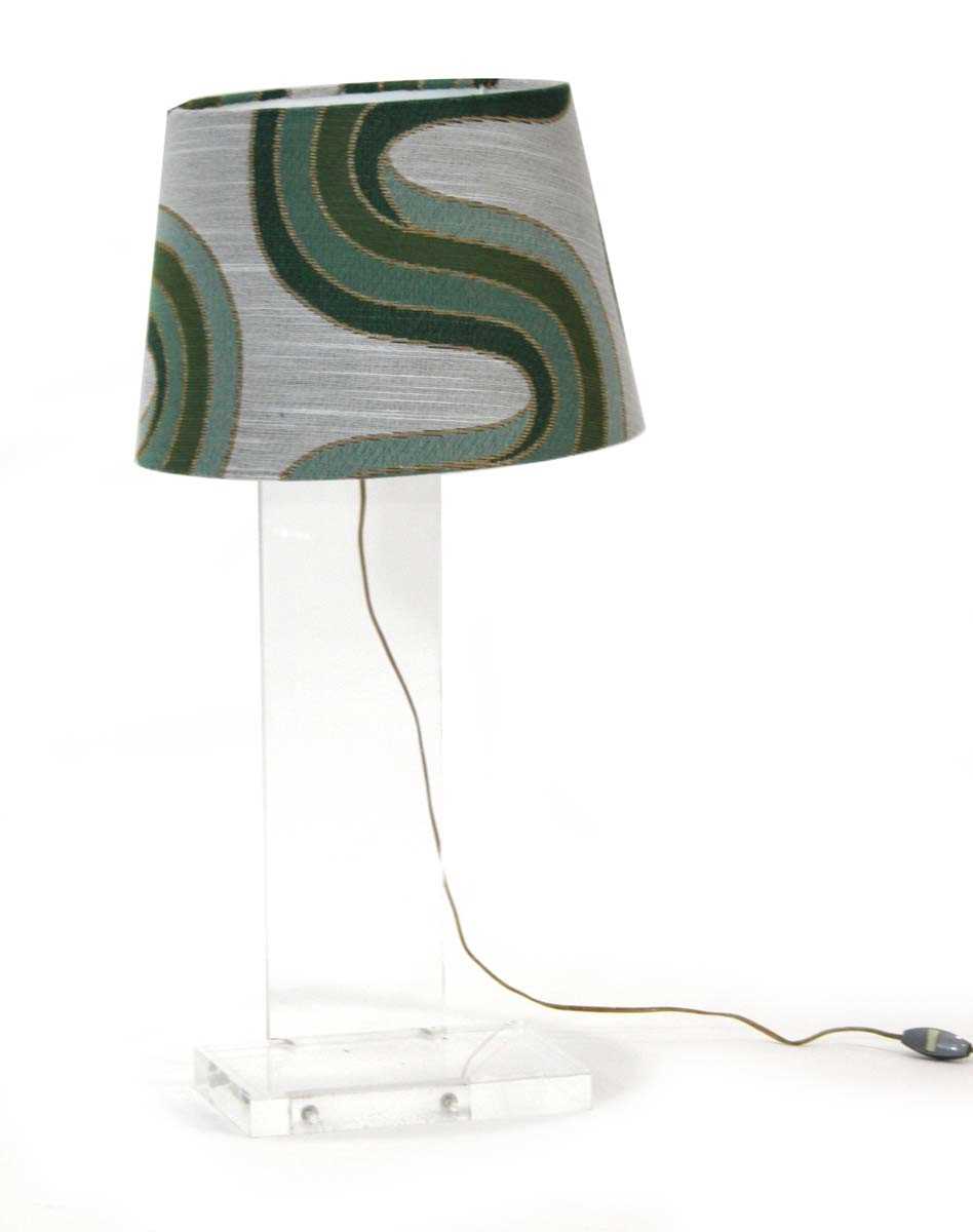 Lot 8 - A 1970/80's lucite table lamp comprised of two...