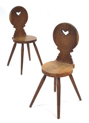 Lot 18 - A pair of Brutalist oak side chairs with heart...