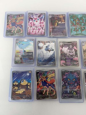 Lot 1412 - Approx. 25 Top Loaded Pokémon cards from...