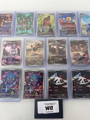 Lot 1412 - Approx. 25 Top Loaded Pokémon cards from...