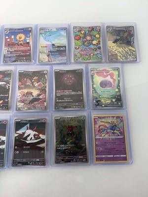 Lot 1412 - Approx. 25 Top Loaded Pokémon cards from...