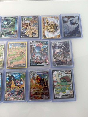 Lot 1413 - Approx. 25 Top Loaded Pokémon cards from...