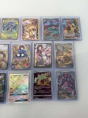 Lot 1414 - Approx. 25 Top Loaded Pokémon cards from...