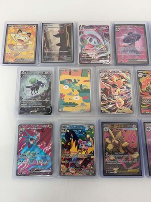 Lot 1415 - Approx. 25 Top Loaded Pokémon cards from...