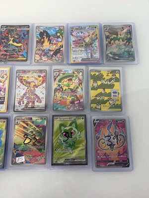 Lot 1415 - Approx. 25 Top Loaded Pokémon cards from...