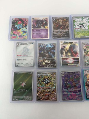 Lot 1416 - Approx. 25 Top Loaded Pokémon cards from...