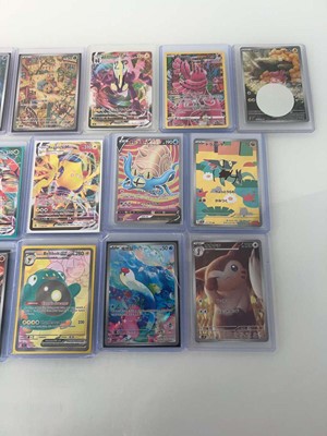 Lot 1416 - Approx. 25 Top Loaded Pokémon cards from...