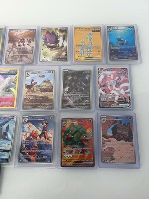 Lot 1417 - Approx. 25 Top Loaded Pokémon cards from...