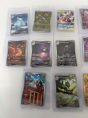 Lot 1421 - Approx. 25 Top Loaded Pokémon cards from...