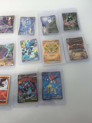 Lot 1421 - Approx. 25 Top Loaded Pokémon cards from...