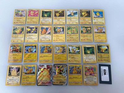 Lot 1423 - Approx. 27 Sleeved Pikachu cards from various...