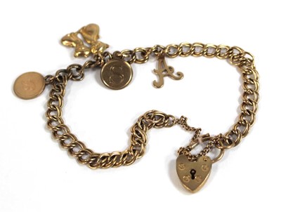 Lot 542 - A 9ct yellow gold double curblink bracelet...