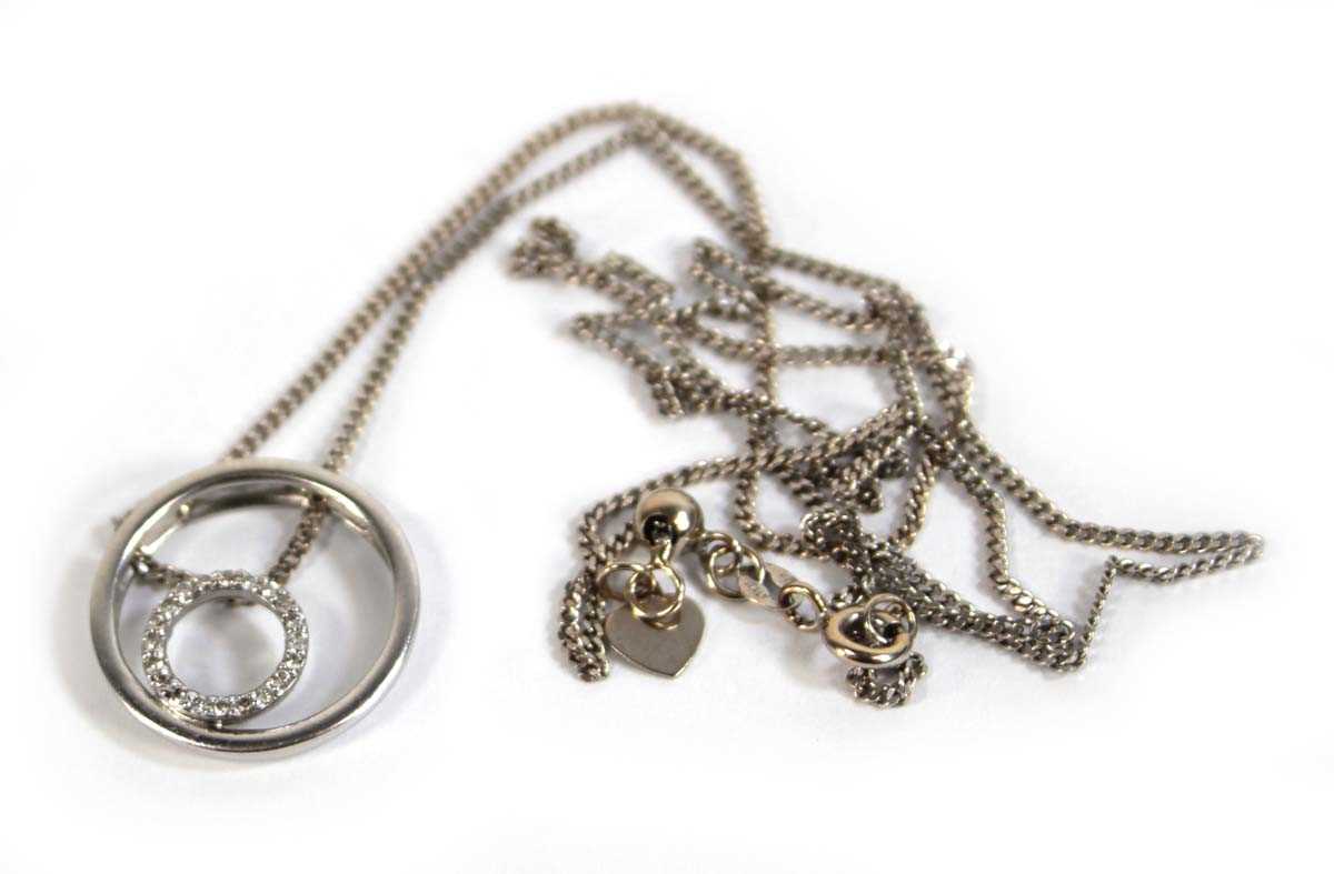Lot 543 - A 9ct white gold flat curblink necklace...