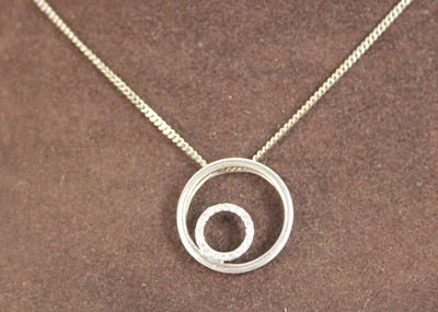 Lot 543 - A 9ct white gold flat curblink necklace...