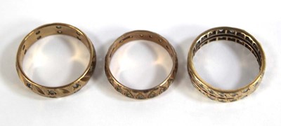 Lot 545 - Three 9ct yellow gold eternity rings set paste,...
