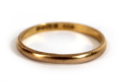 Lot 550 - A 22ct yellow gold wedding band, Birmingham...
