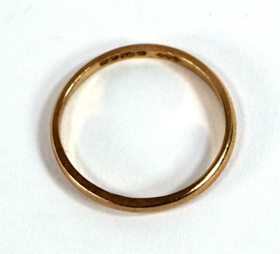 Lot 550 - A 22ct yellow gold wedding band, Birmingham...