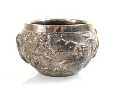 Lot 347 - An Indian metalwares bowl with relief hunting...