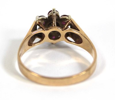 Lot 559 - A 9ct yellow gold cluster ring set small...