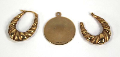 Lot 561 - A 9ct yellow gold St Christopher pendant,...