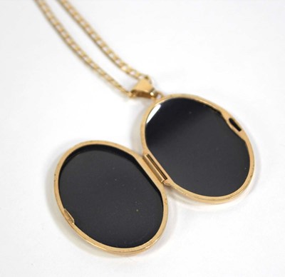 Lot 562 - A 9ct yellow gold flat curblink necklace...