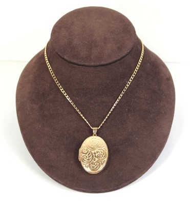 Lot 562 - A 9ct yellow gold flat curblink necklace...