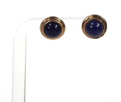 Lot 565 - A pair of 9ct yellow gold ear studs, each set...