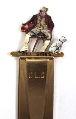 Lot 566 - A 14ct yellow gold bookmark the end decorated...
