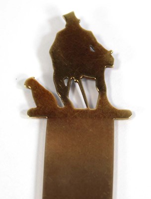 Lot 566 - A 14ct yellow gold bookmark the end decorated...