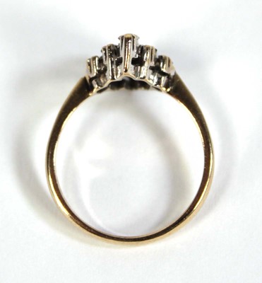 Lot 568 - A 9ct yellow gold cluster ring set five small...