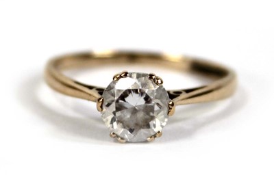 Lot 571 - A 9ct yellow gold ring set paste in a six claw...