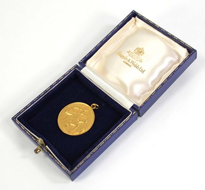 Lot 575 - A 9ct yellow gold St Christopher pendant,...
