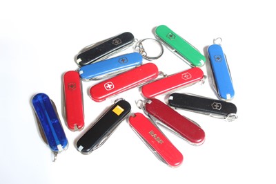 Lot 1073 - Twelve various Victorinox keyring size pocket...