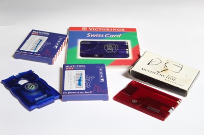 Lot 1077 - Victorinox Swiss Card, together with five...